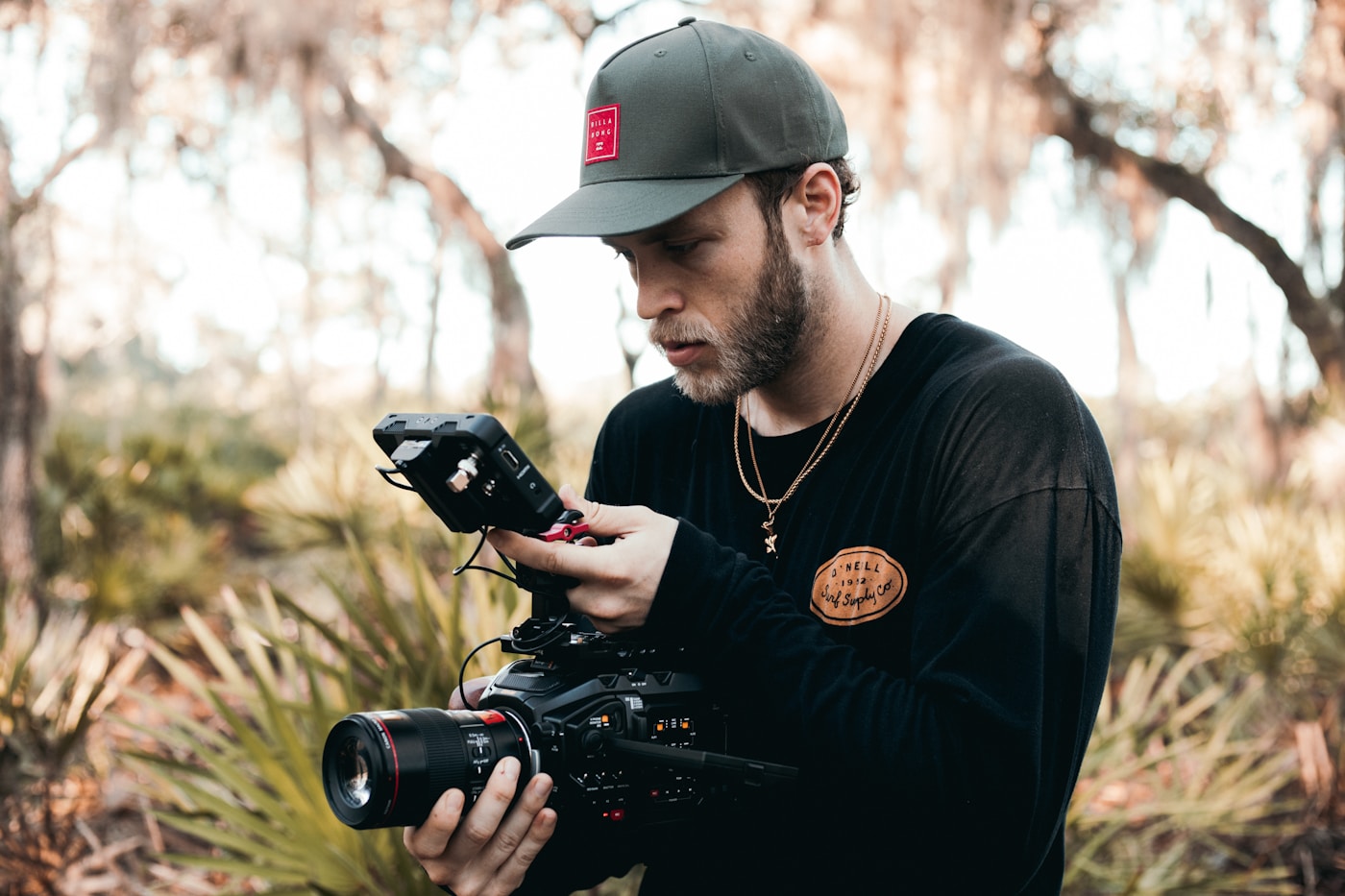 Camera operator preparing a real brand production